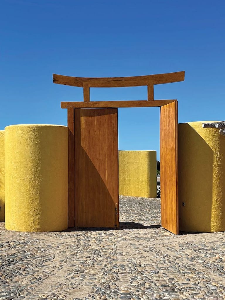The gate to Sol de Oriente is inspired by a Shinto “torii.”
